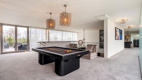 het-meest-bekeken-huis-op-funda-pooltafel