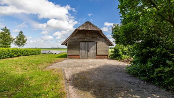 rietgedekte woonboerderij Zuidlaren schuur