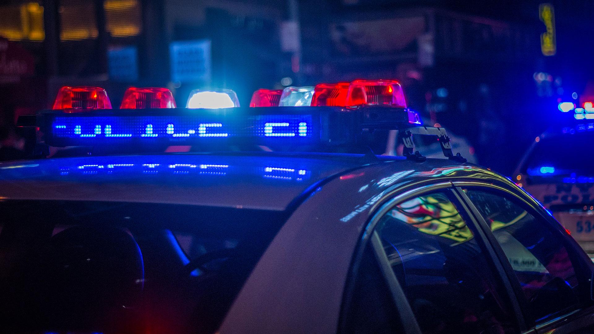 Politie zwaailichten politieauto sirene