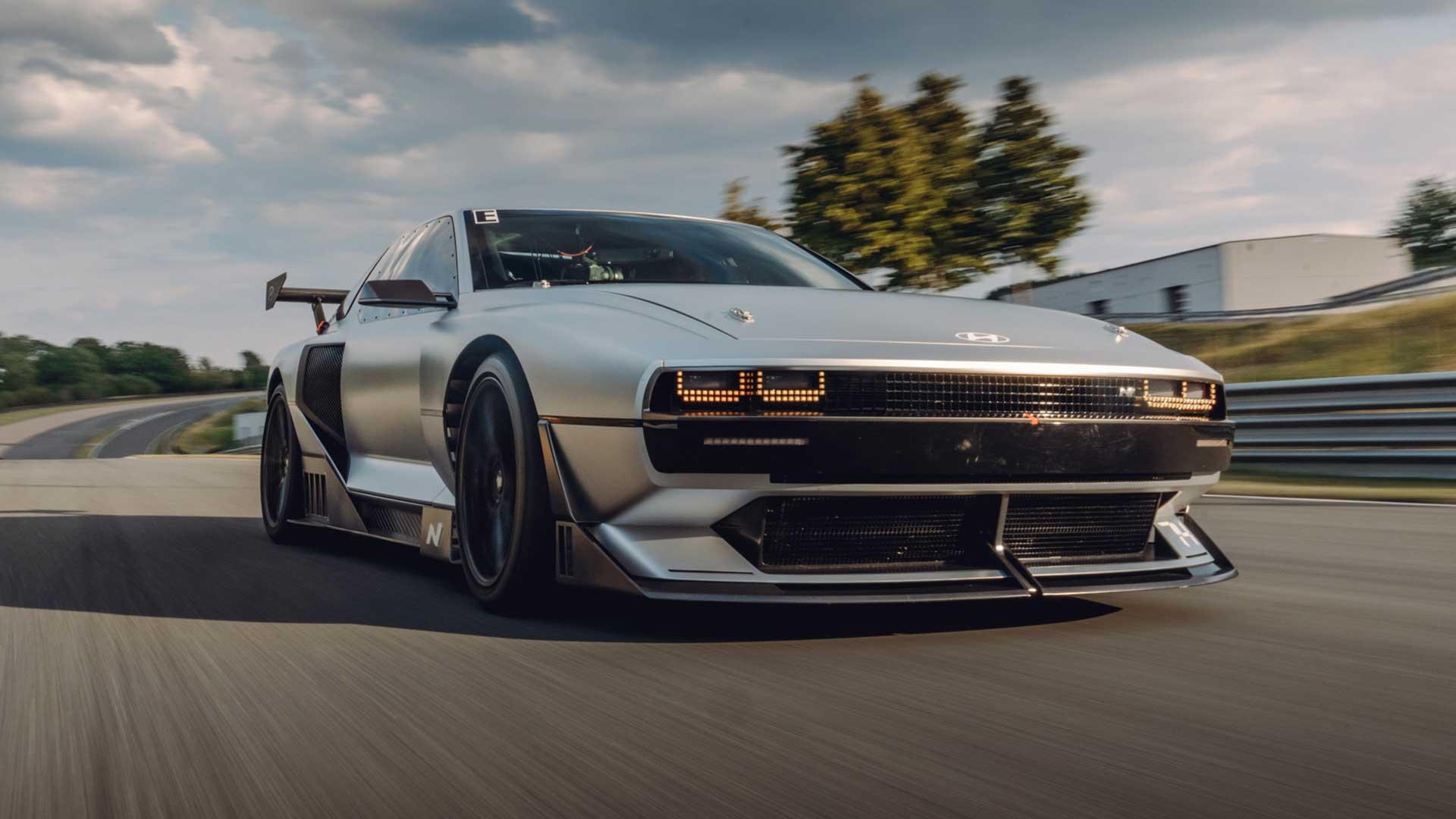 Hyundai N Vision 74 driving on a circuit diagonally in front