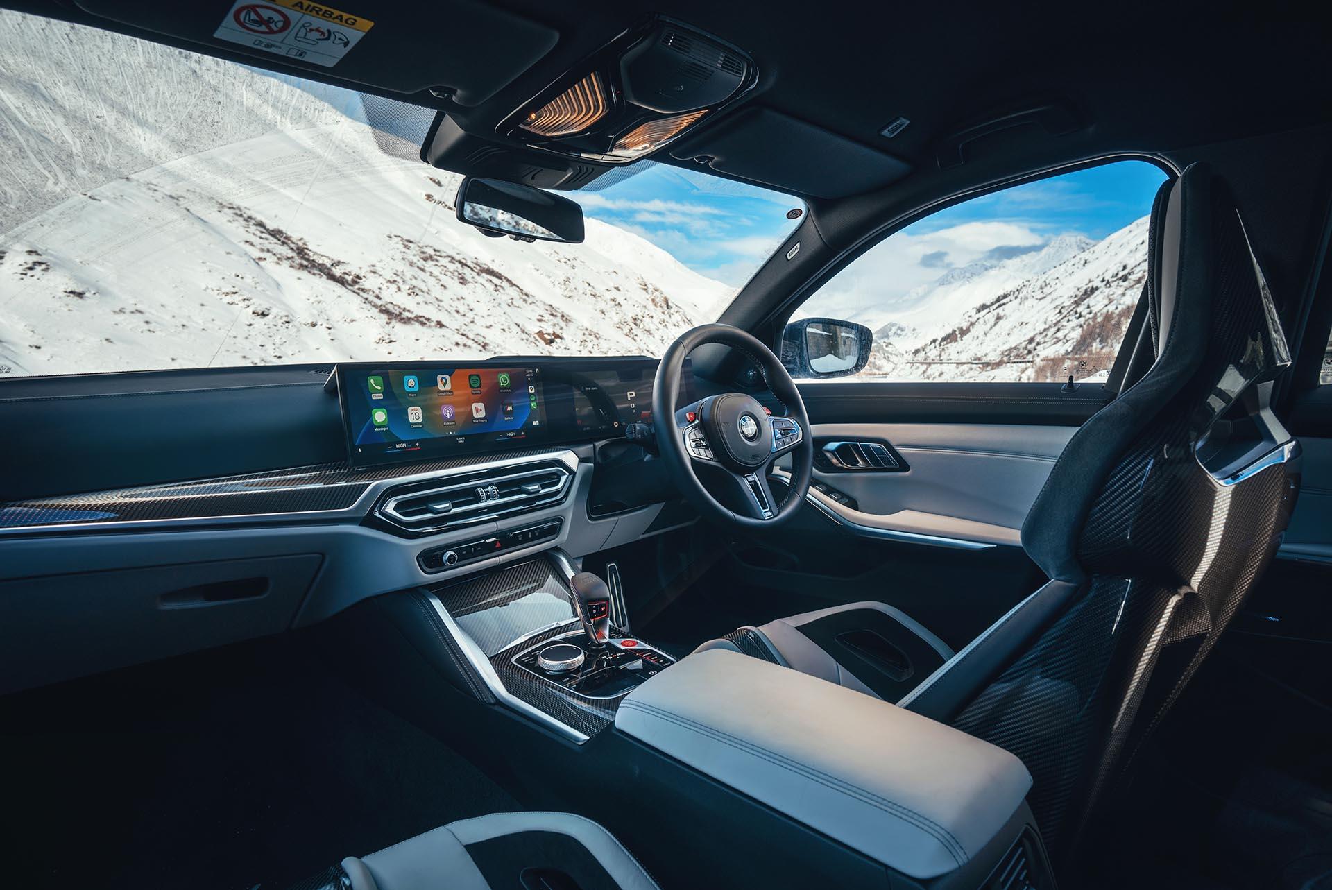 BMW M3 Touring interieur overzicht bergen sneeuw