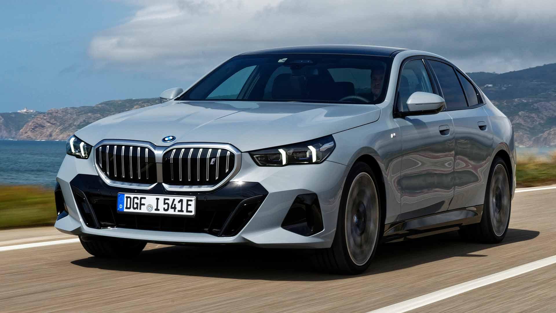 BMW i5 eDrive40 driving diagonally in front