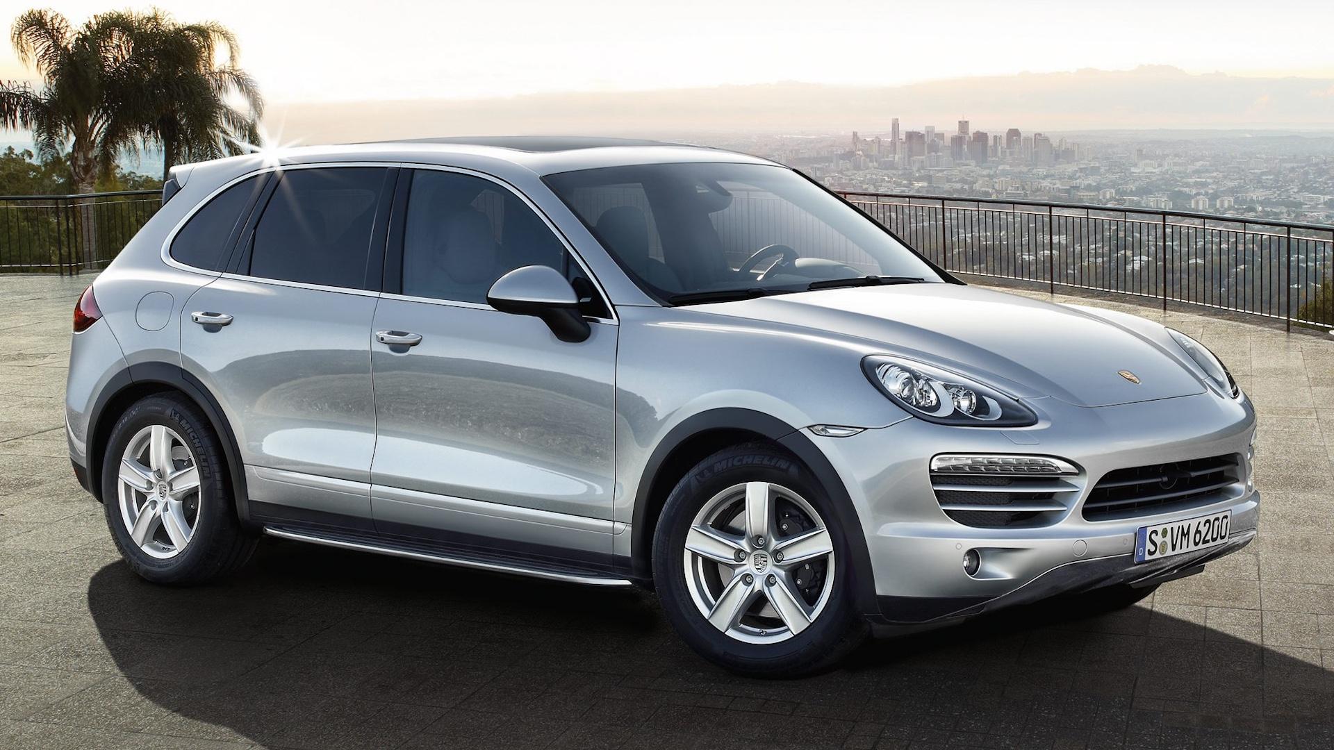 Porsche Cayenne grijs zijkant voor