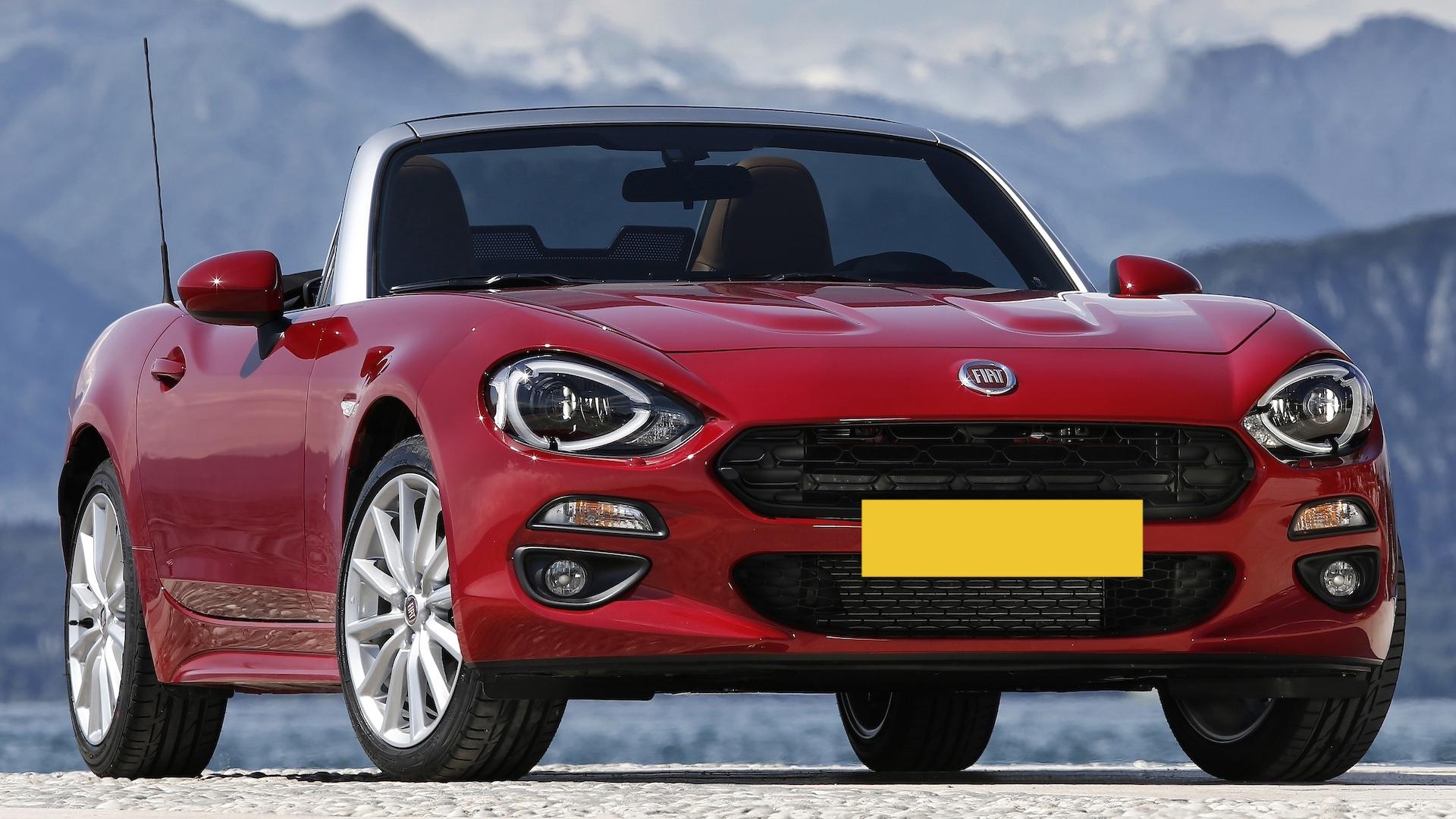 Fiat 124 Spider rood zijkant NL plaat