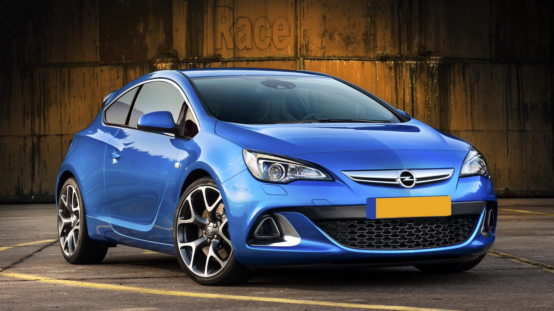 Opel Astra OPC (2012) blauw zijkant rechts schuin voor