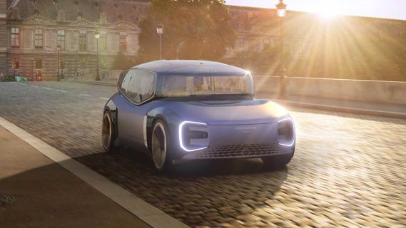 Volkswagen Gen.Travel concept rijdend op een weg schuin voor