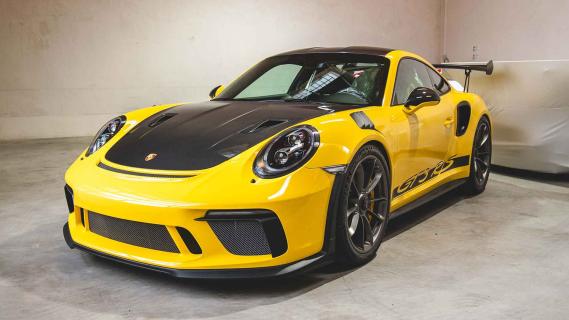 Porsche 911-collectie te koop met vrachtwagen en trailer 911 GT3 RS schuin voor