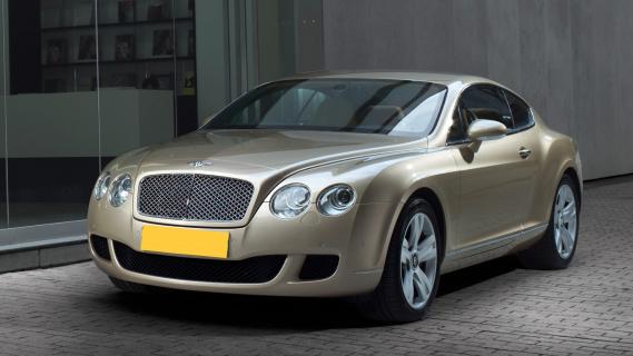 Bentley Continental GT beige zijkant voor links header