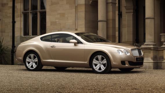 Bentley Continental GT beige zijkant voor links schuin