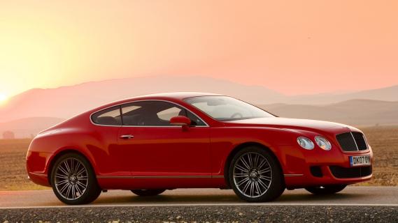 Bentley Continental GT Speed (2007) rood zijkant rechts voor schuin zon