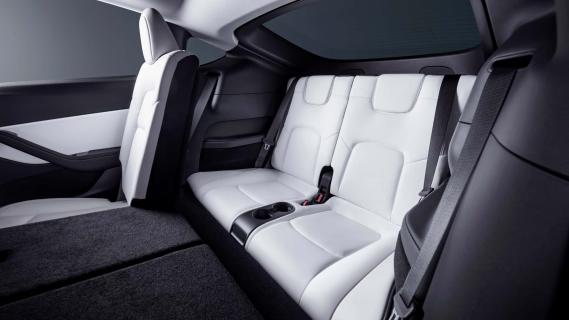 Tesla Model Y interieur wit achterbank