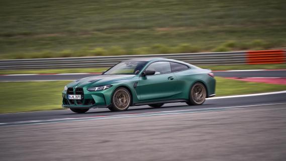 BMW M4 CS groen zijkant bocht