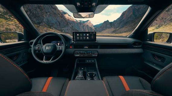 Honda Passport oranje (2026) interieur dashboard