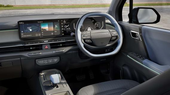 Kia Syros grijs (2025) interieur dashboard schuin