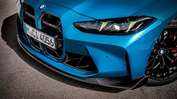 BMW M3 CS Touring (G81) Laguna Seca blauw (2025) voorzijde detail koplampen grille splitter