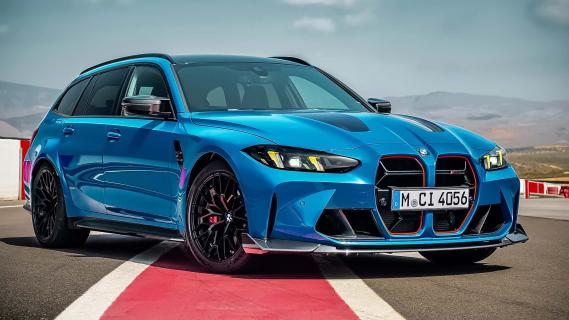 BMW M3 CS Touring (G81) Laguna Seca blauw (2025) zijkant rechtsvoor schuin op circuit