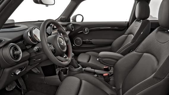 Mini Cooper S (F56) geel (2014) interieur zwart zijkant