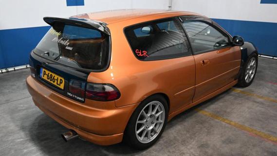 Honda Civic VTI (EG) goud (1995) domeinen zijkant rechts schuin achter