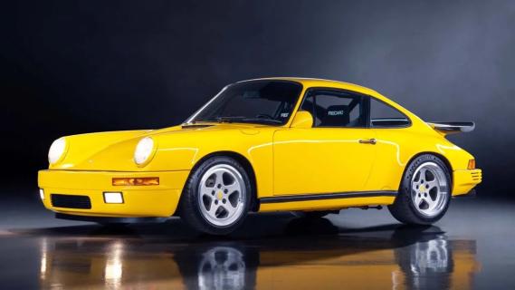 Ruf CTR Yellowbird geel (1987) zijkant links schuin voor