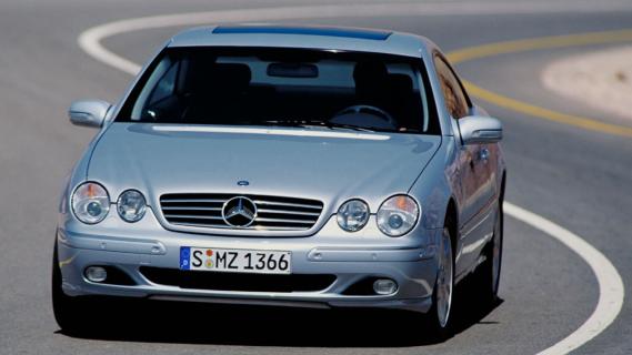 Mercedes CL 500 (C215) zilver (1999) voorkant rijdend door bocht