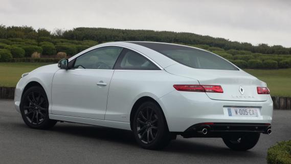 Renault Laguna (X51) Coupe wit (2011) zijkant rechts schuin achter
