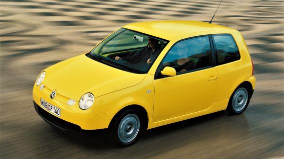 Volkswagen Lupo TDI 3L (1999) geel zijkant links schuin voor rijdend