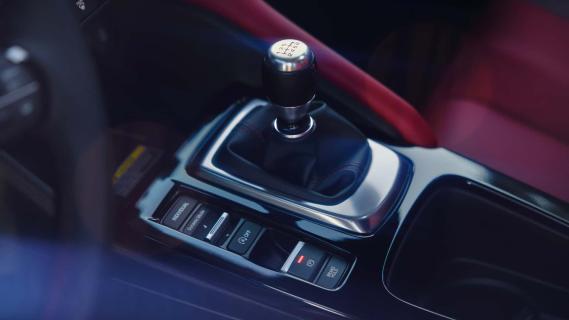 Acura Integra A-Spec (2025) rood leer middentunnel handbak