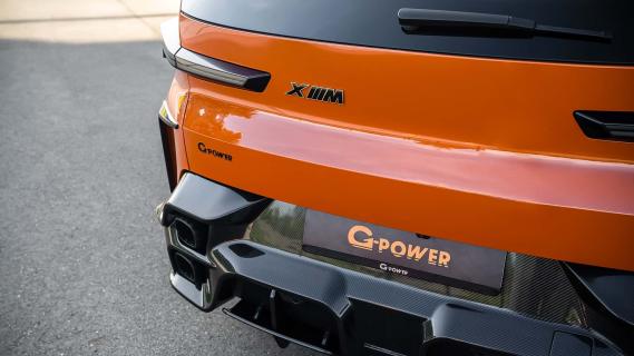G-Power BMW XM (G09) oranje (2025) zijkant achterzijde detail
