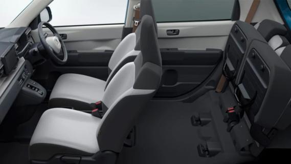 Honda N One e: blauw (2025) interieur zijkant links