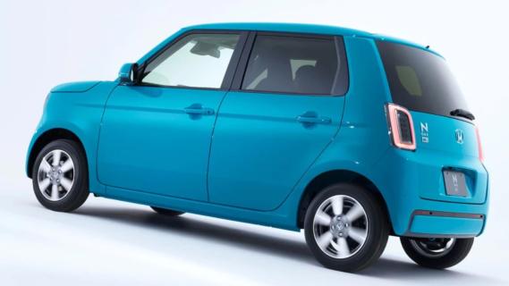 Honda N One e: blauw (2025) zijkant links schuin achter