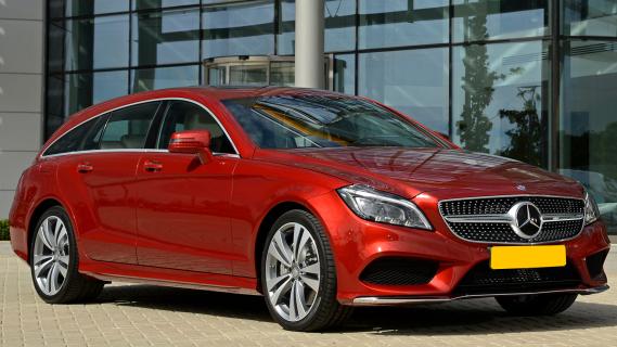 Mercedes CLS 500 Shooting Brake (X218) rood (2014) zijkant rechts schuin voor