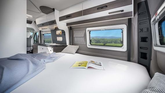 VANTourer Camper Fiat Ducato wit (2025) interieur slaapkamer