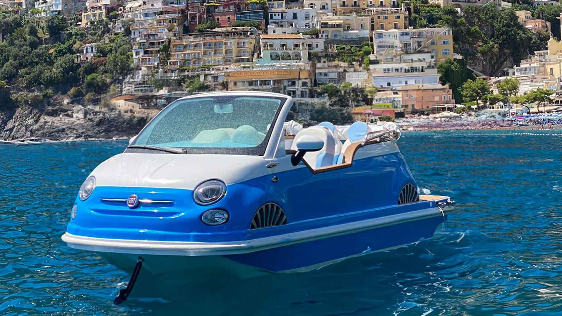 Fiat 500 in front of the boat