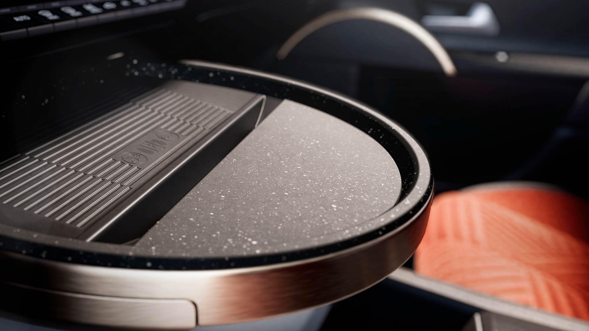 Lancia Ypsilon 2024: review - interieur detail koffietafel