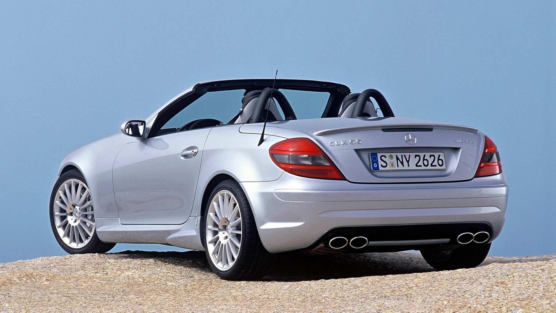 Mercedes SLK 55 AMG (R171) grijs (2004) zijkant linksachter schuin dak open