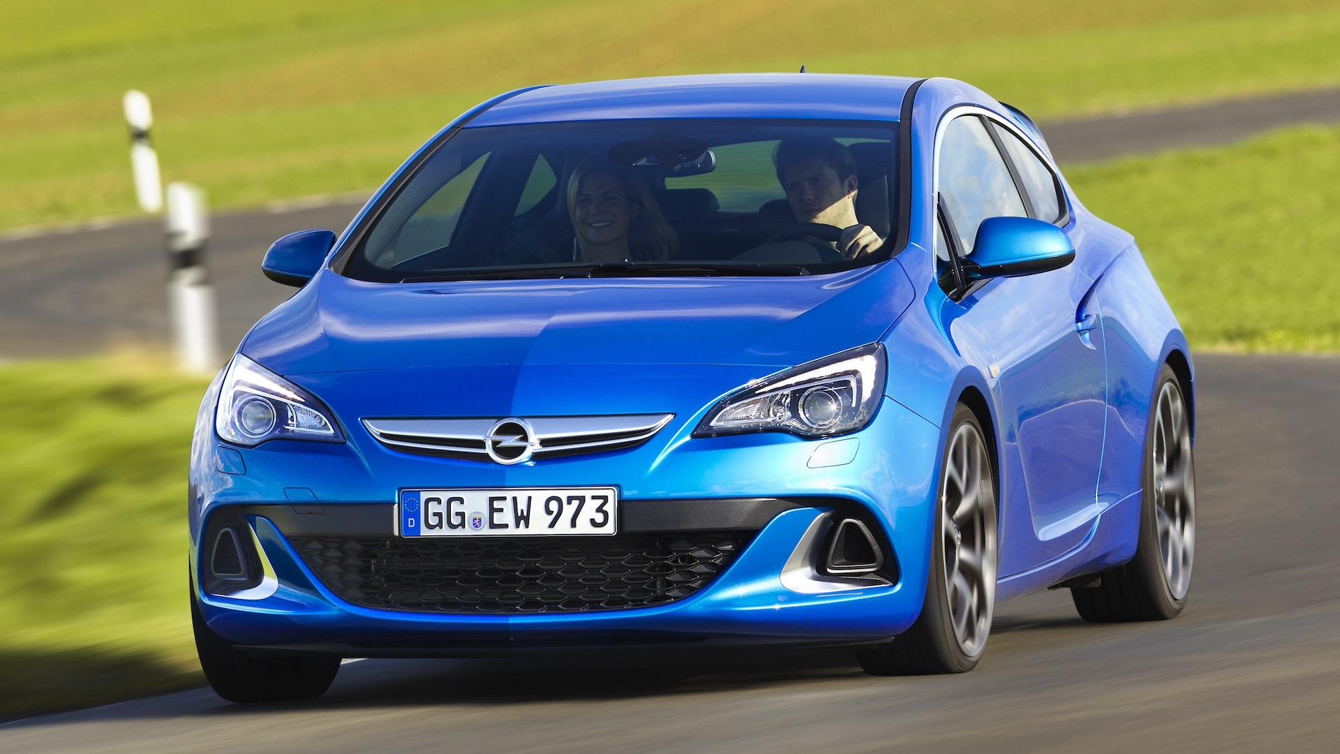 Opel Astra OPC (2012) blauw zijkant links voor buiten