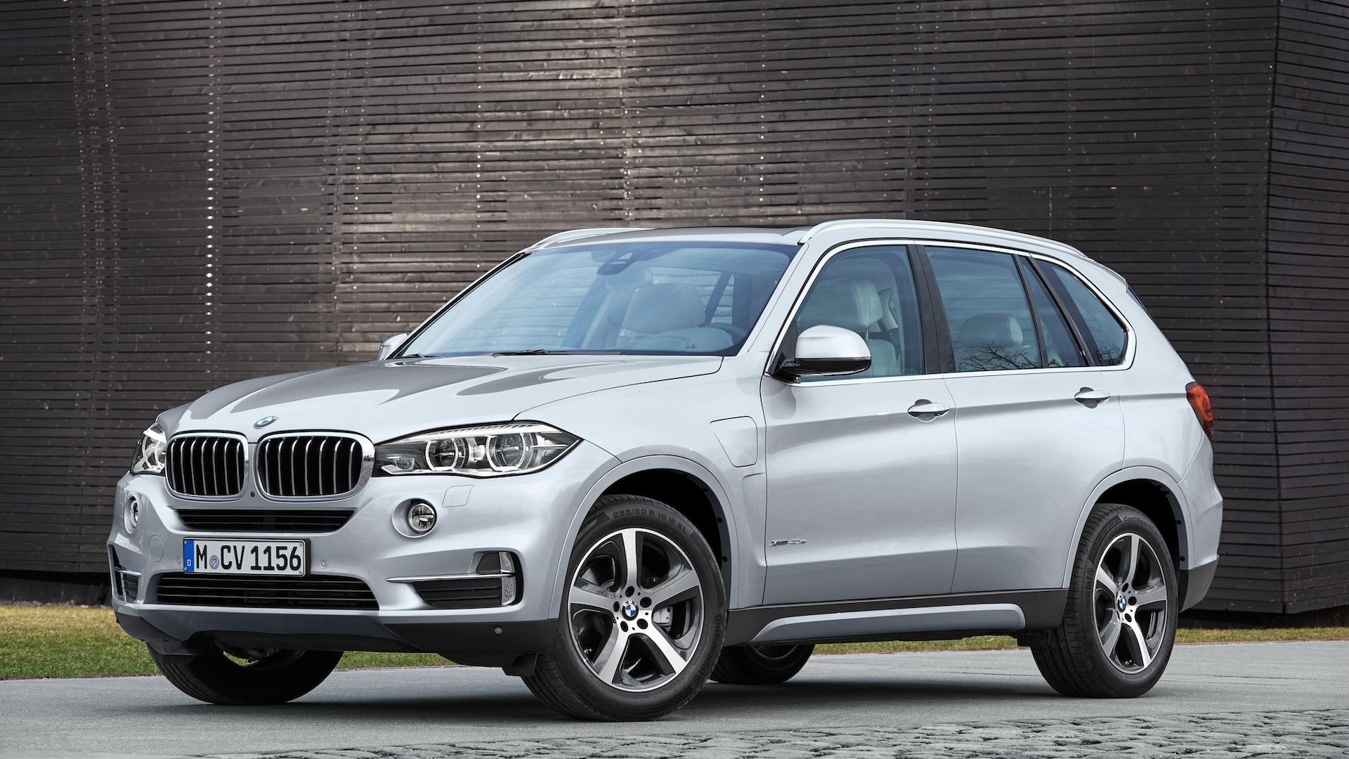 BMW X5 xDrive40e (F15) grijs (2015) zijkant links schuin voor