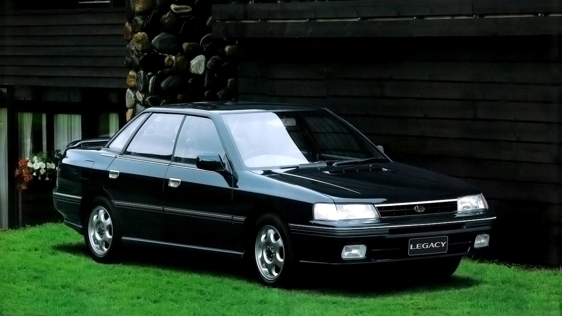 Subaru Legacy RS (BC) blauw (1990) zijkant rechts schuin voor