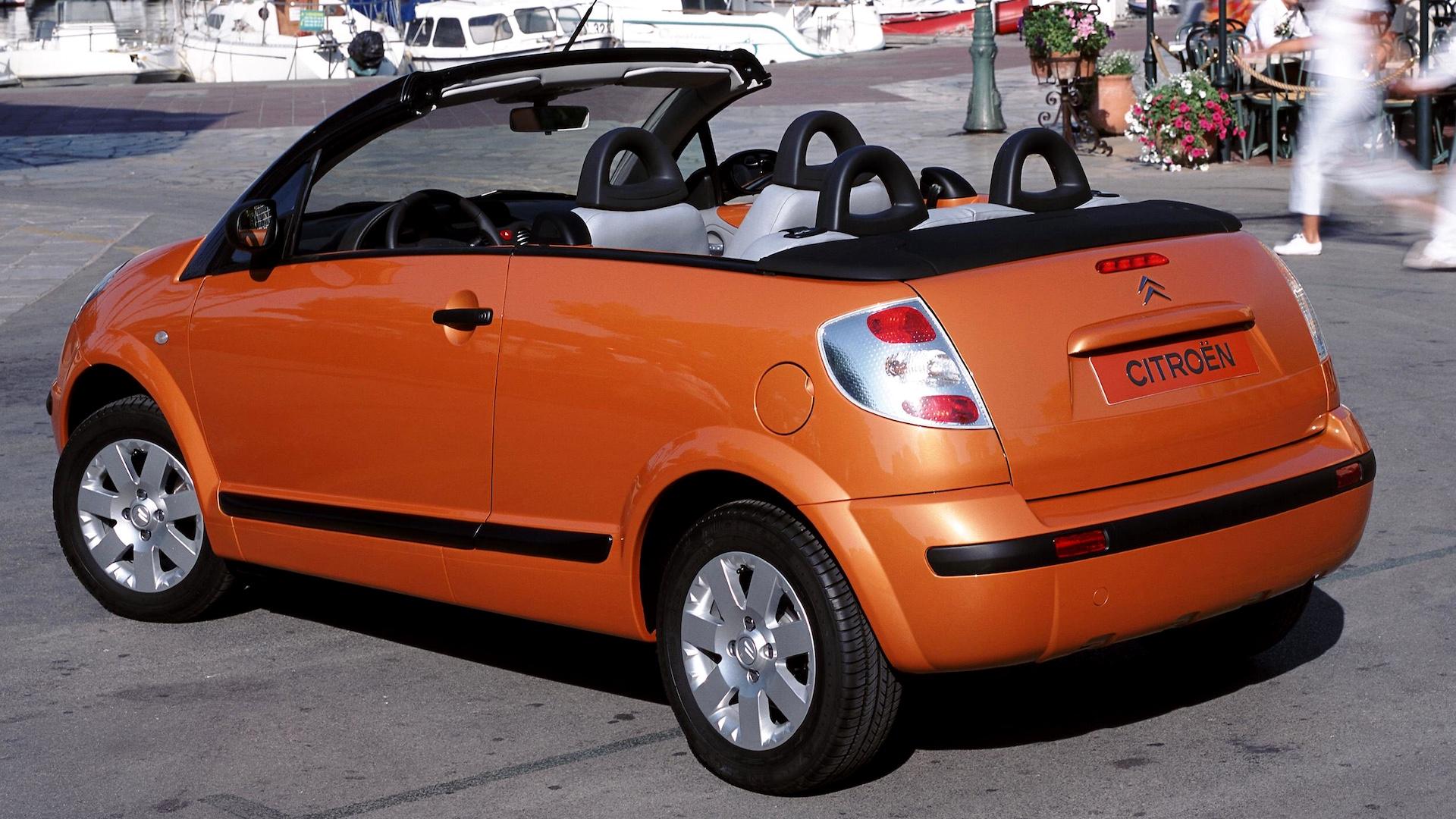 Citroen C3 Pluriel oranje (2003) zijkant links schuin achter goedkope cabrio