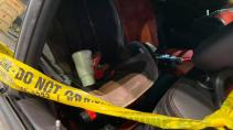 Dodge Challenger Hellcat gestolen en gecrasht interieur achter babyzitje