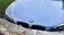 BMW 5-serie omgewaaide boom