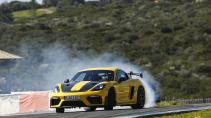 Drift met rook Porsche 718 Cayman GT4 RS