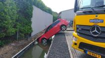 Audi A3 in water kraan van berger