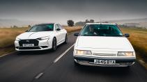 DS9 vs Citroën XM rijdend op een weg voorkant