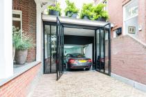 Speel Batman in dit droomhuis met eigen autolift